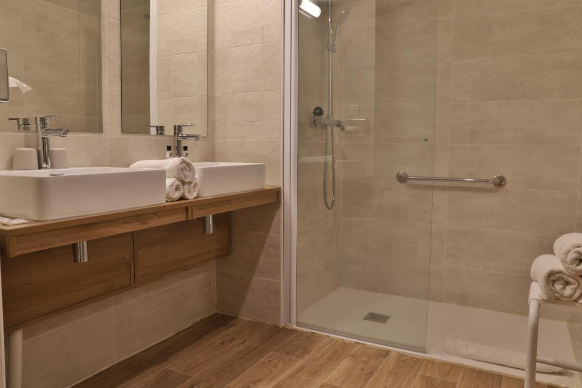 Salle de bains dans l'établissement SOWELL HOTELS Mont Blanc et SPA