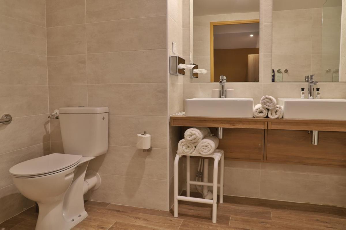 Salle de bains dans l'établissement SOWELL HOTELS Mont Blanc et SPA