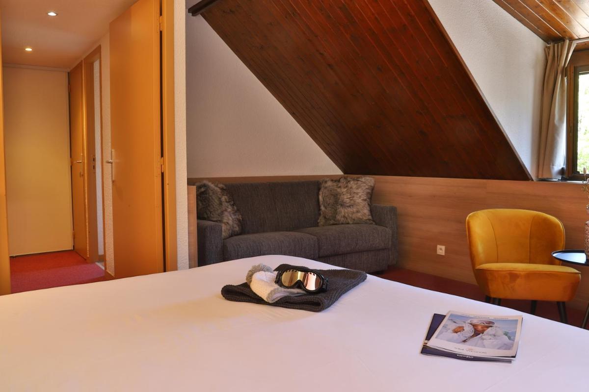 Coin salon dans l'établissement SOWELL HOTELS Mont Blanc et SPA