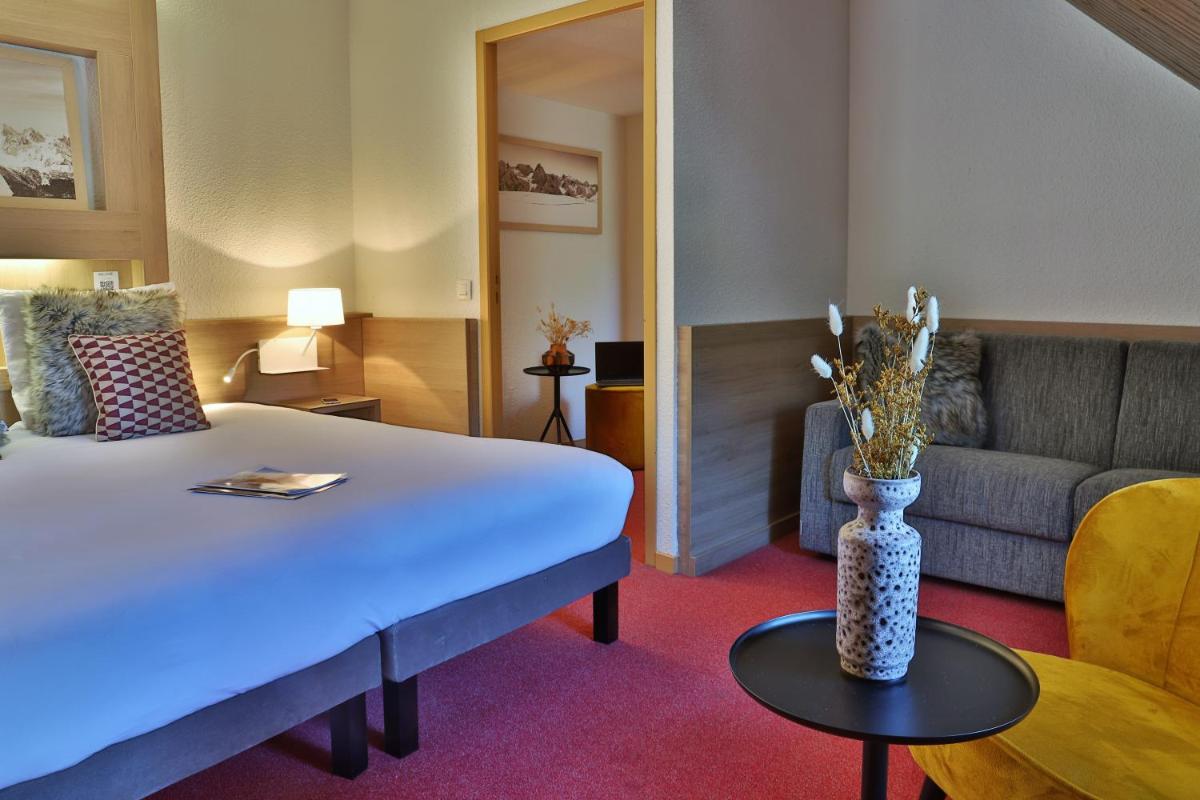 Coin salon dans l'établissement SOWELL HOTELS Mont Blanc et SPA
