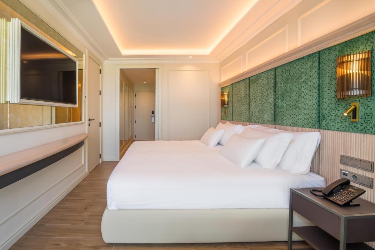 Cama o camas de una habitación en Barceló La Nucía Palms