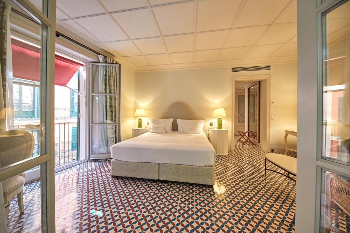 Cama o camas de una habitación en Hotel Cappuccino - Palma