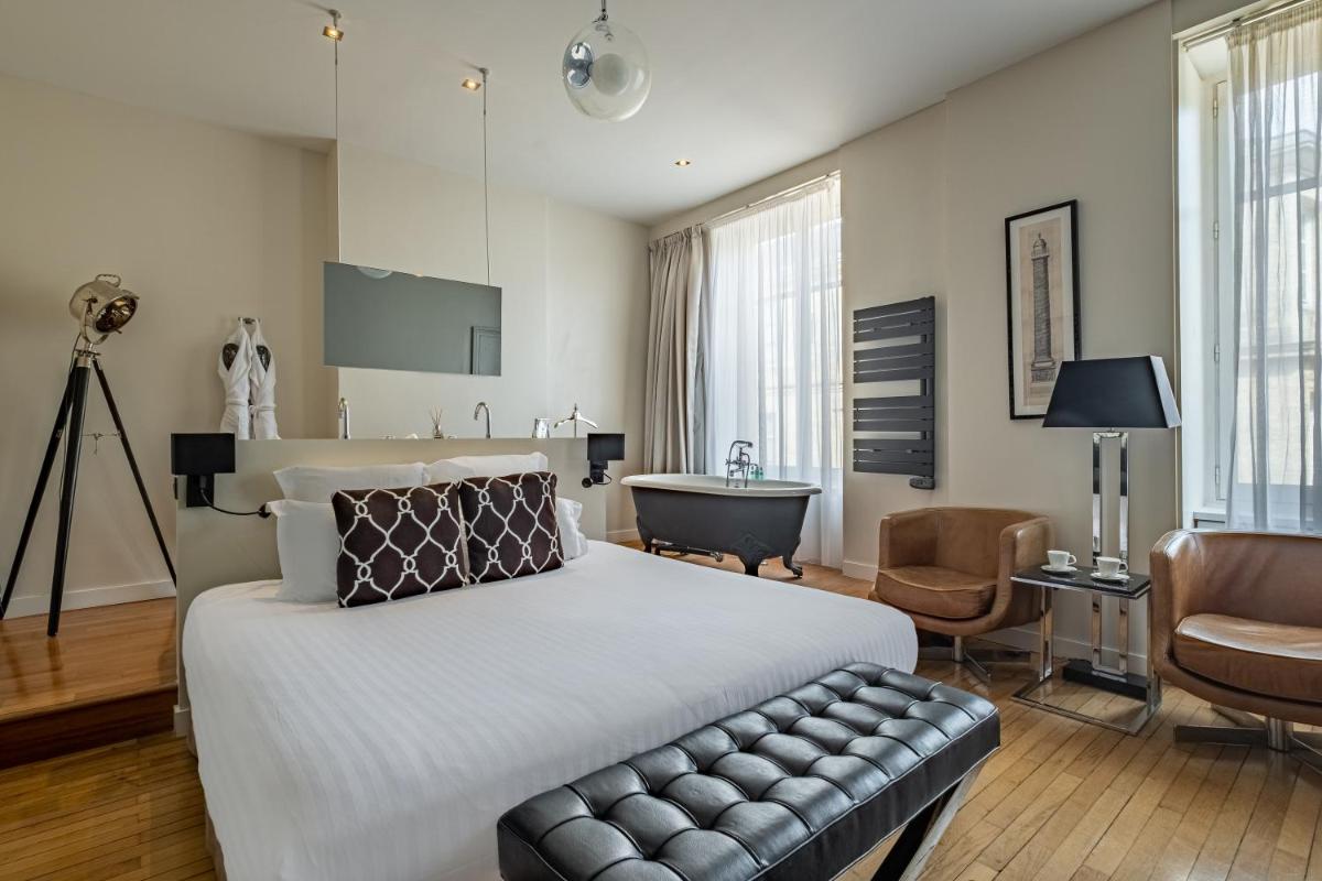 Télévision ou salle de divertissement dans l'établissement Le Boutique Hotel & Spa
