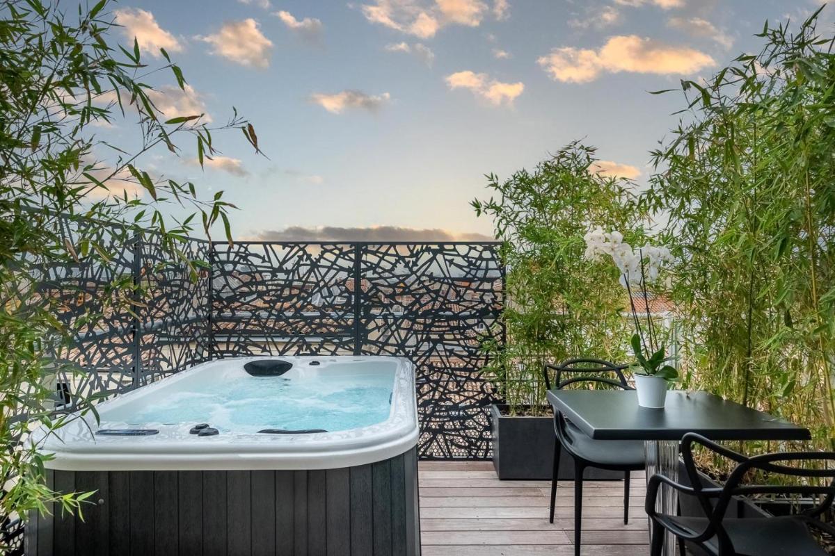 Jardin de l'établissement Le Boutique Hotel & Spa