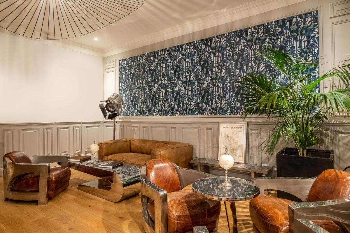 Coin salon dans l'établissement Le Boutique Hotel & Spa