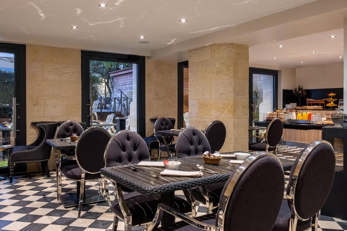 Coin salon dans l'établissement Le Palais Gallien Hôtel & Spa