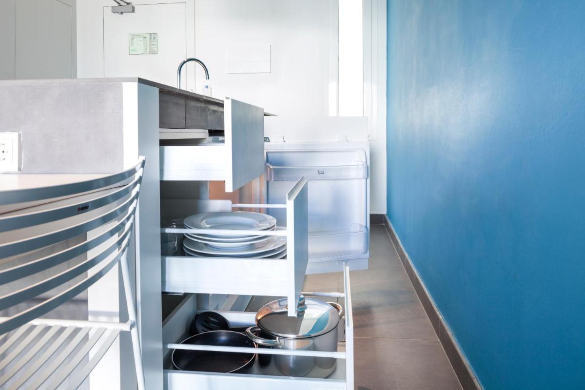 Una cocina o zona de cocina en Ebano Hotel Apartments & Spa