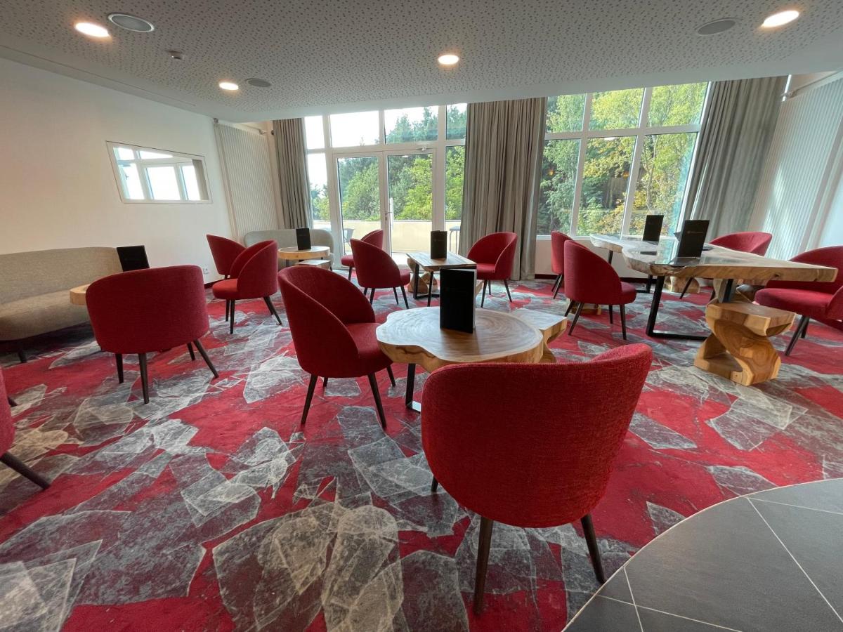 Coin salon dans l'établissement Hotel SPA Husseren Collections - Proche Colmar - Eguisheim