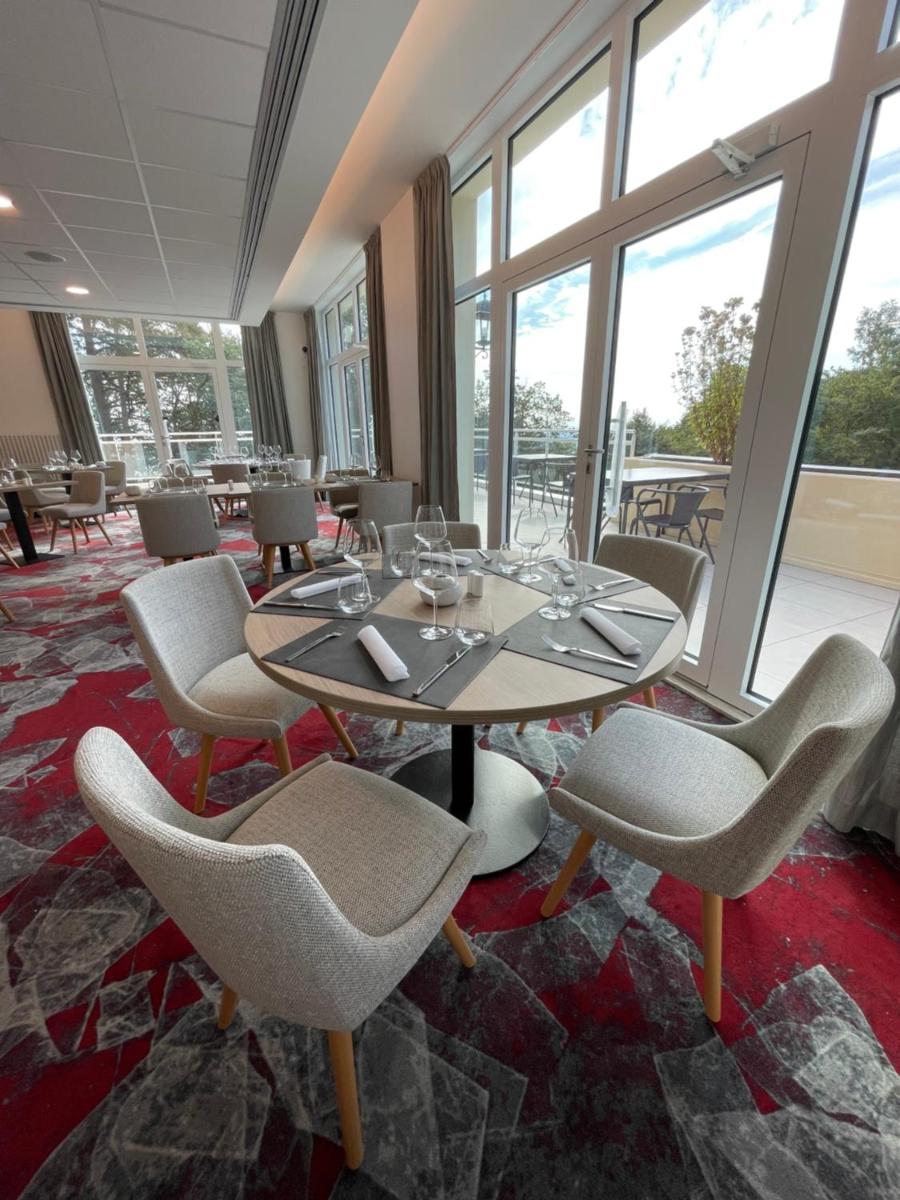 Coin salon dans l'établissement Hotel SPA Husseren Collections - Proche Colmar - Eguisheim