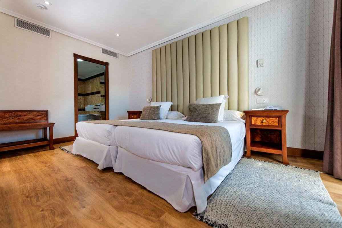 Cama o camas de una habitación en Paradise Park Fun Lifestyle Hotel