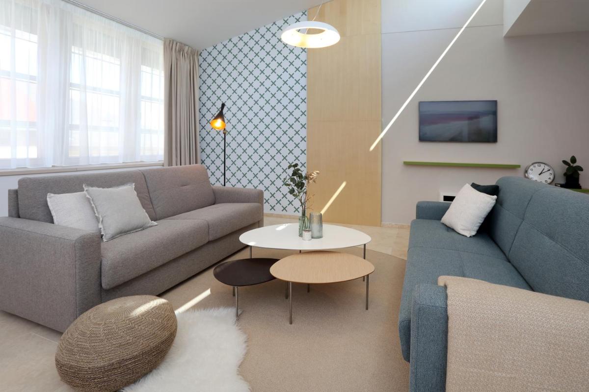 Apartmány OMEGA - Housity