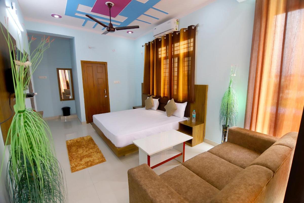 Hotel Comfort Inn Homestay - Housity