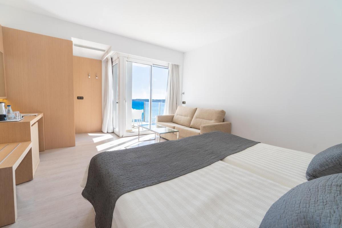 Cama o camas de una habitación en CM Playa del Moro
