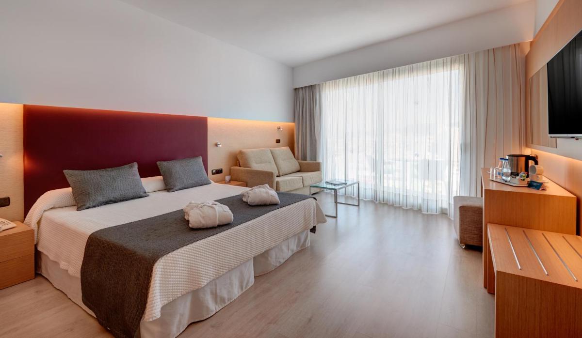 Cama o camas de una habitación en CM Playa del Moro