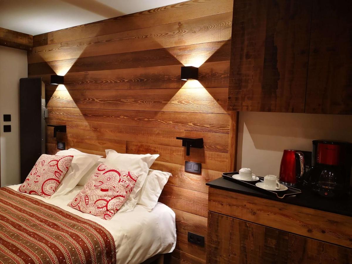 Un ou plusieurs lits dans un hébergement de l'établissement Alliey & Spa Piscine Appart-hôtel Serre chevalier