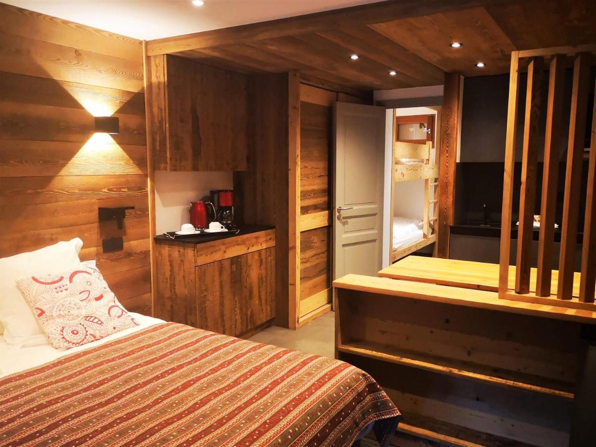 Un ou plusieurs lits dans un hébergement de l'établissement Alliey & Spa Piscine Appart-hôtel Serre chevalier