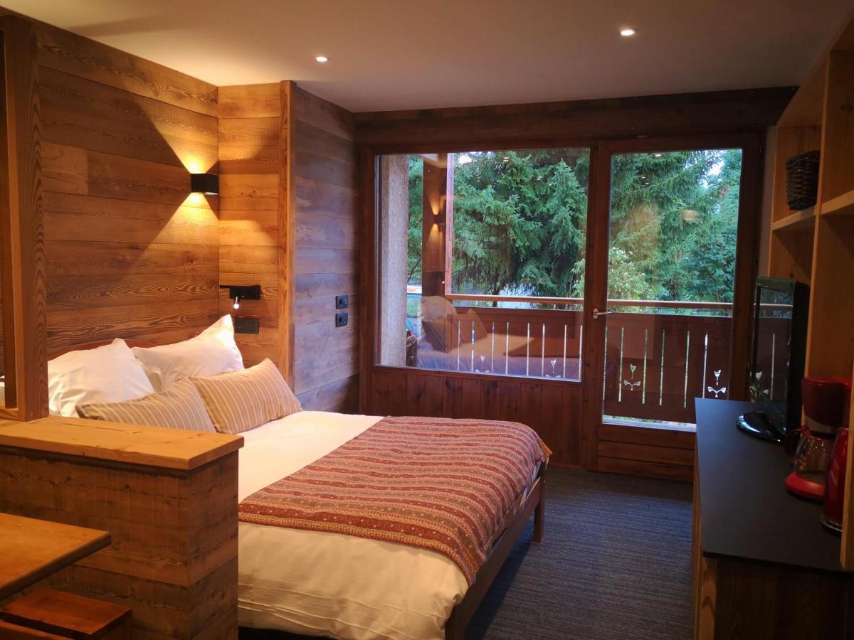 Un ou plusieurs lits dans un hébergement de l'établissement Alliey & Spa Piscine Appart-hôtel Serre chevalier