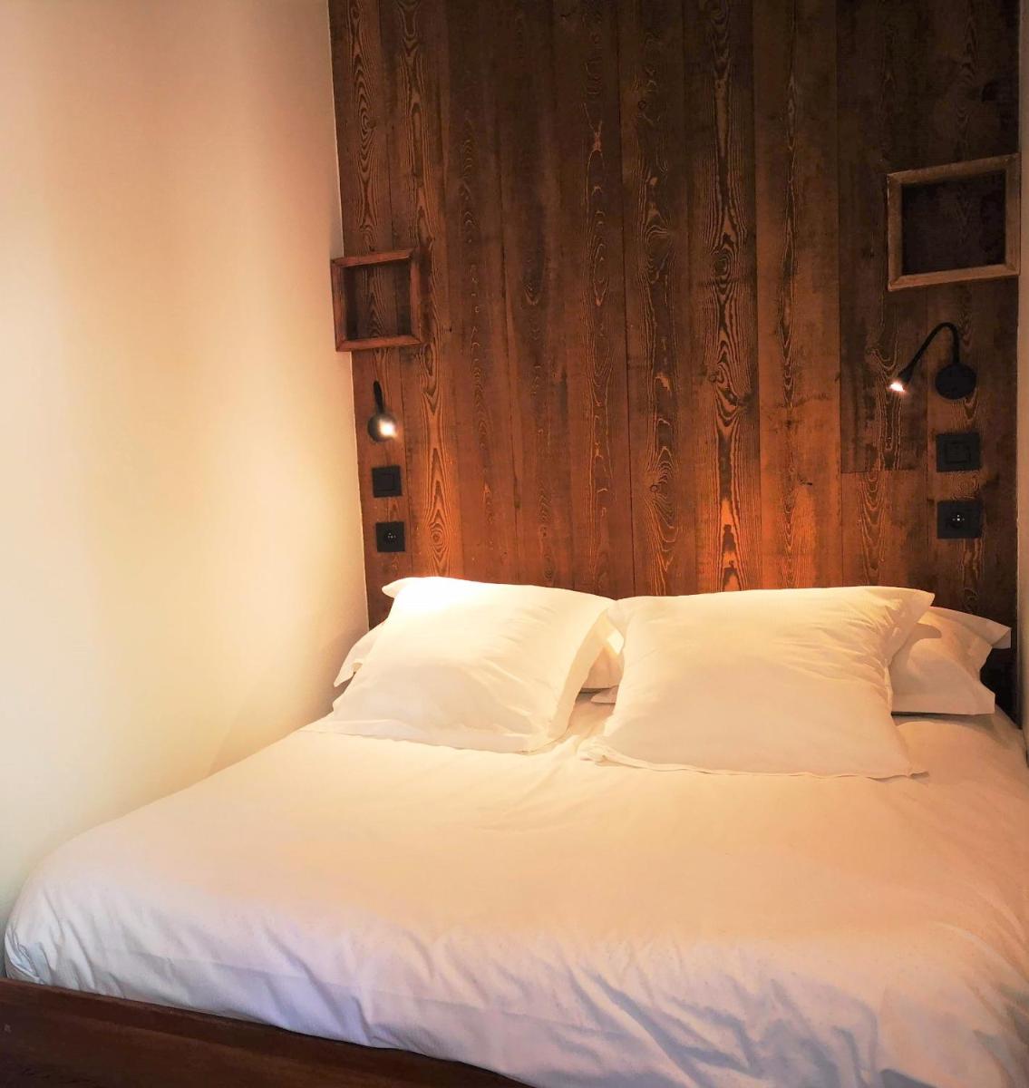 Un ou plusieurs lits dans un hébergement de l'établissement Alliey & Spa Piscine Appart-hôtel Serre chevalier