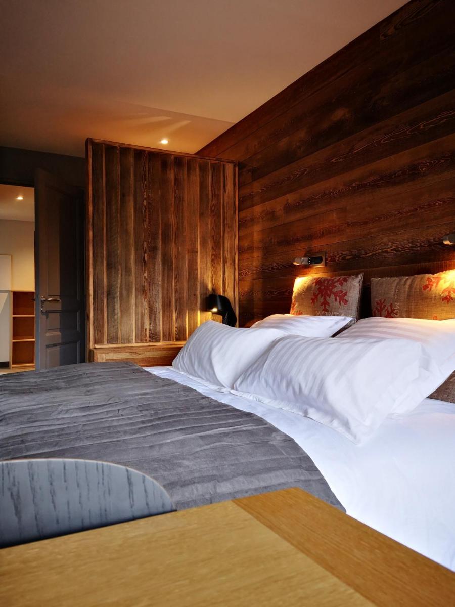 Un ou plusieurs lits dans un hébergement de l'établissement Alliey & Spa Piscine Appart-hôtel Serre chevalier