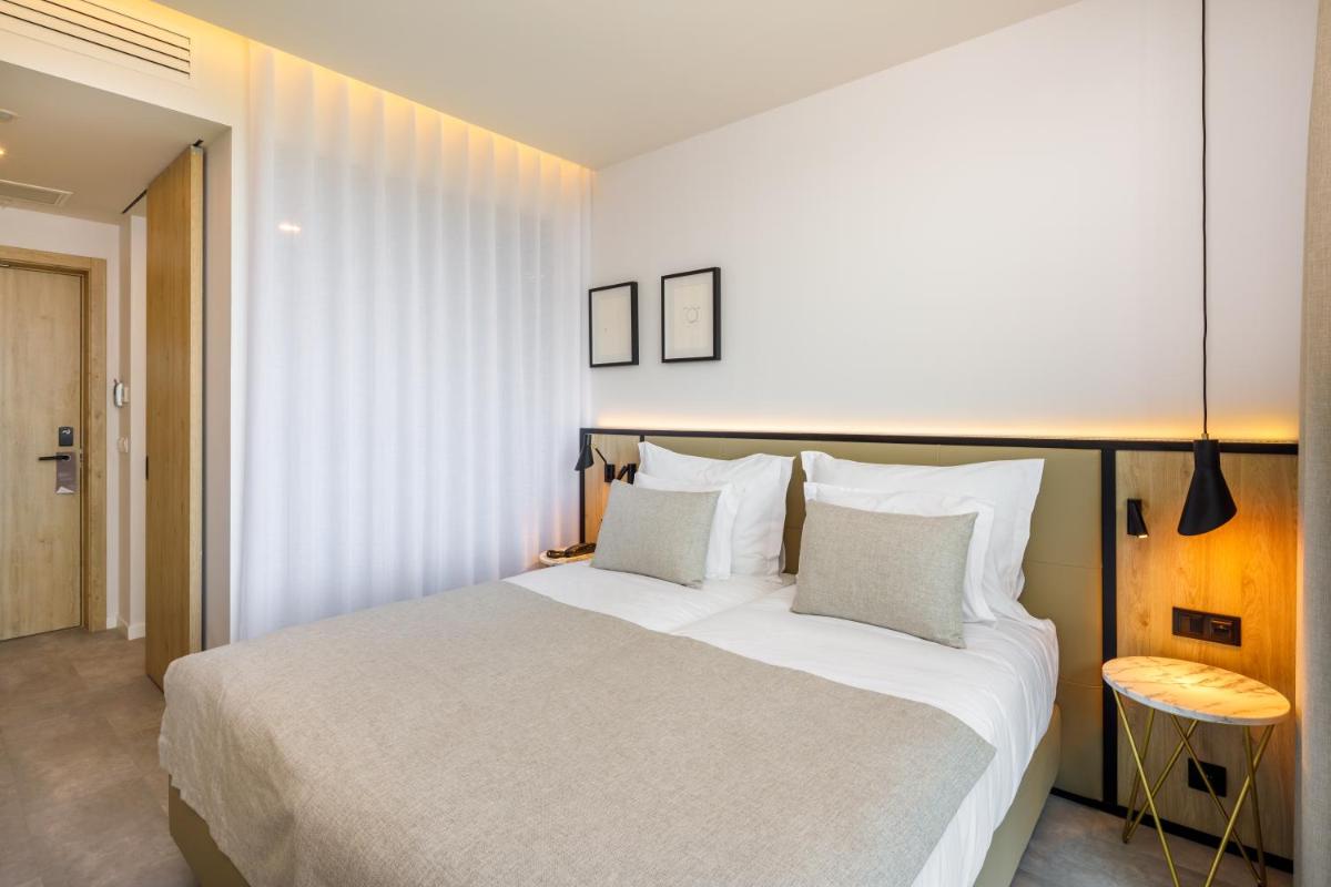 Uma cama ou camas num quarto em AP Cabanas Beach & Nature - Adults Friendly