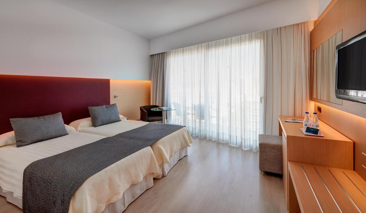 Cama o camas de una habitación en CM Playa del Moro