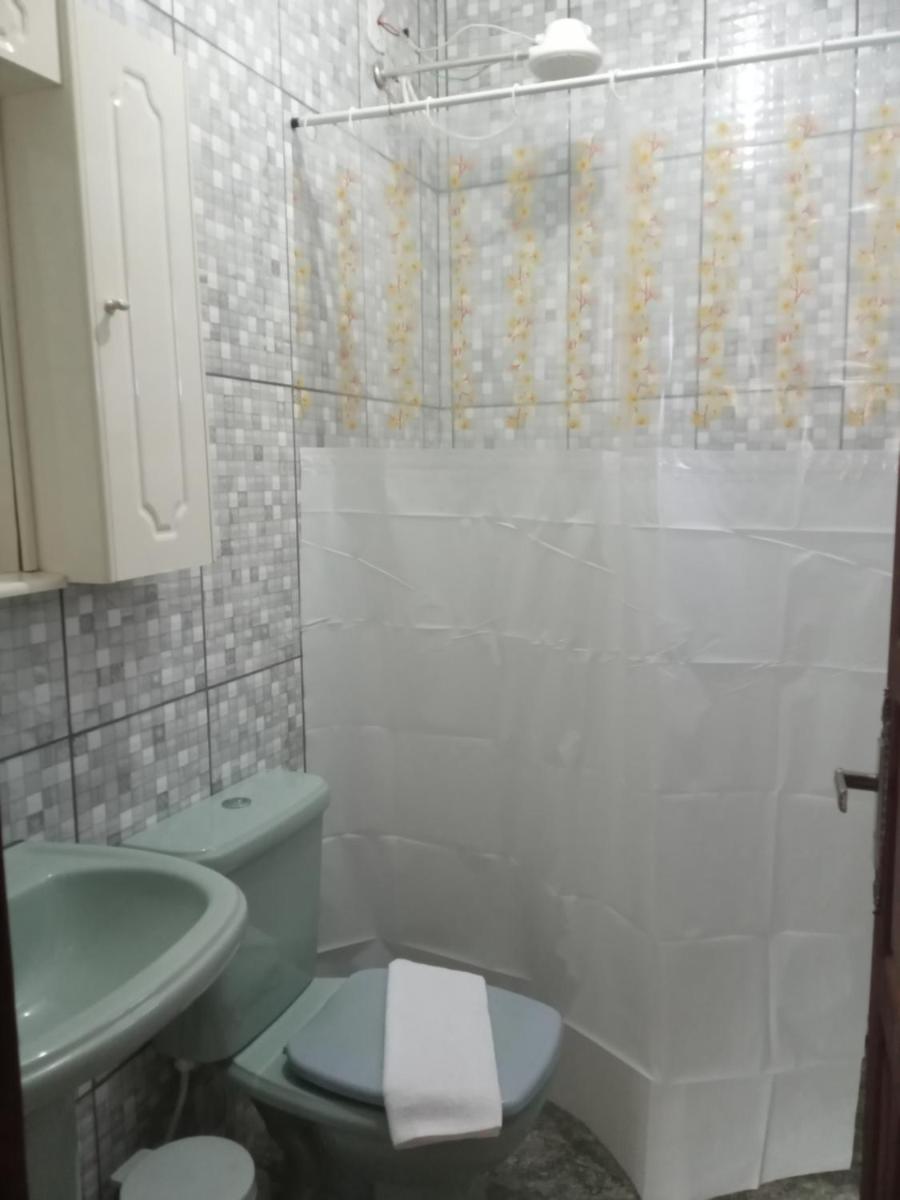 Cantinho meu! Suíte completa com entrada separada da casa principal. Lugar tranquilo e aconchegante. - Housity