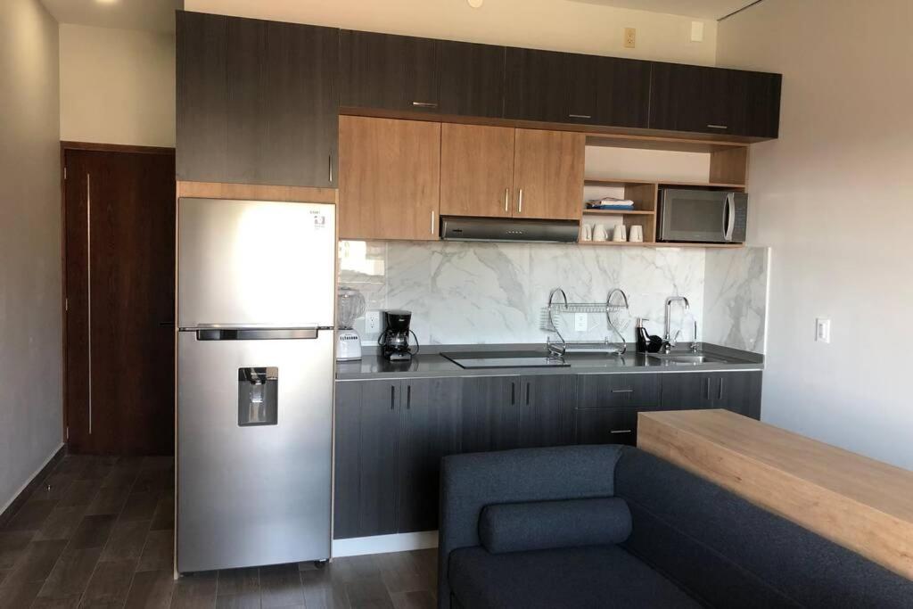 Suitetrails - Cómodo studio dentro de Sierra Apartments, hasta para 4 personas