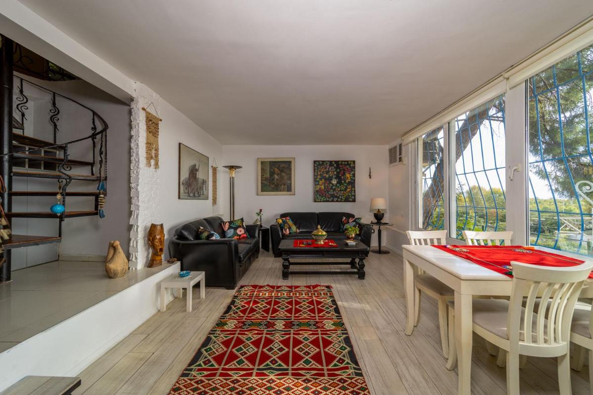 House with Tree Inside near Sea in Maltepe - Housity