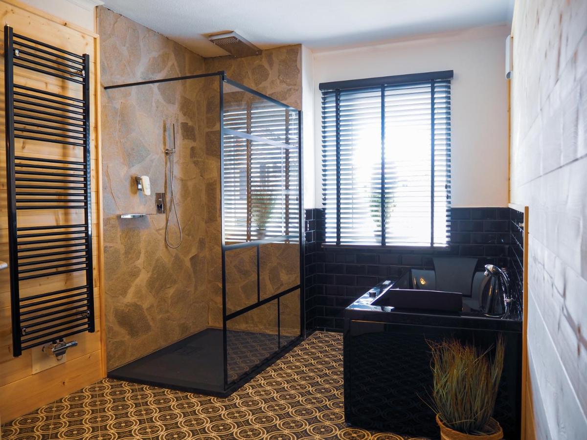 Ein Badezimmer in der Unterkunft ALPENLIEBE - Sauna & Whirlpool - APARTments