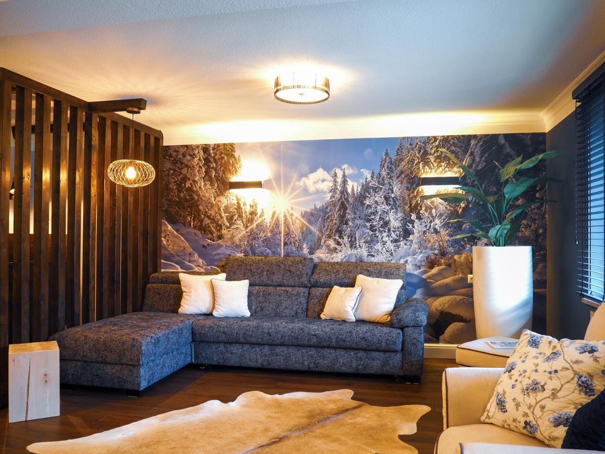 Ein Sitzbereich in der Unterkunft ALPENLIEBE - Sauna & Whirlpool - APARTments