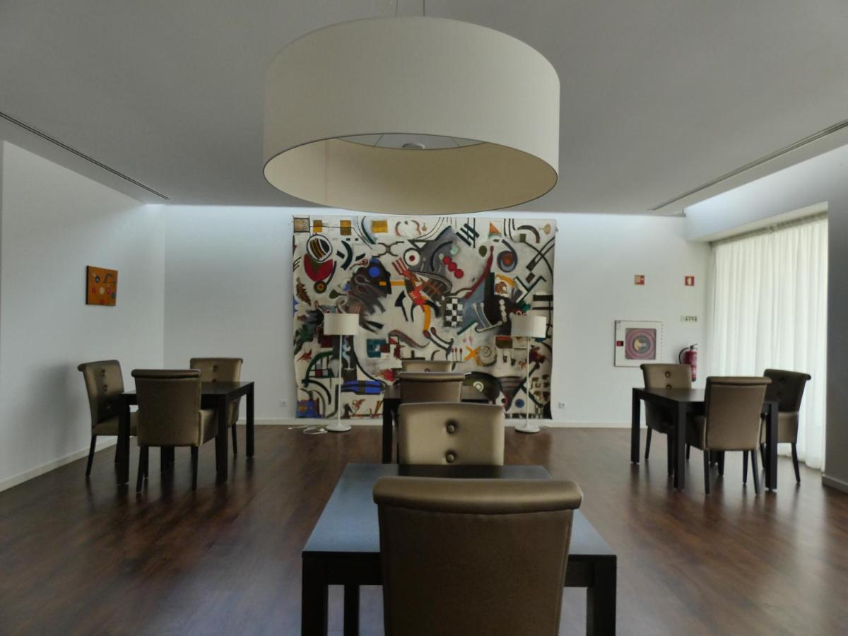 Uma área de estar em Hotel Vila D'Óbidos