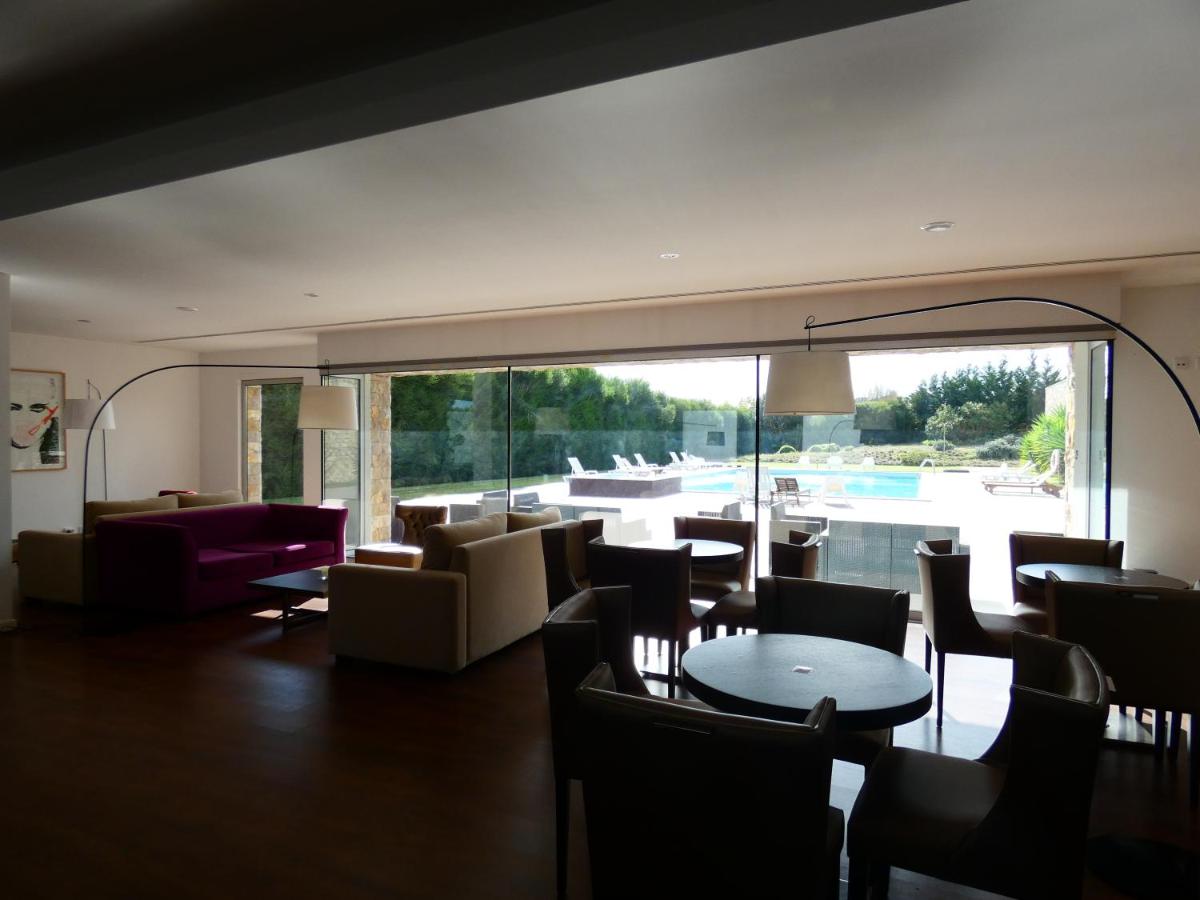 Uma área de estar em Hotel Vila D'Óbidos