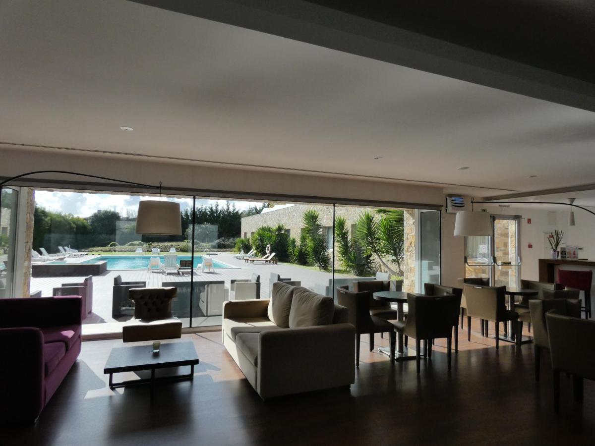 Uma área de estar em Hotel Vila D'Óbidos