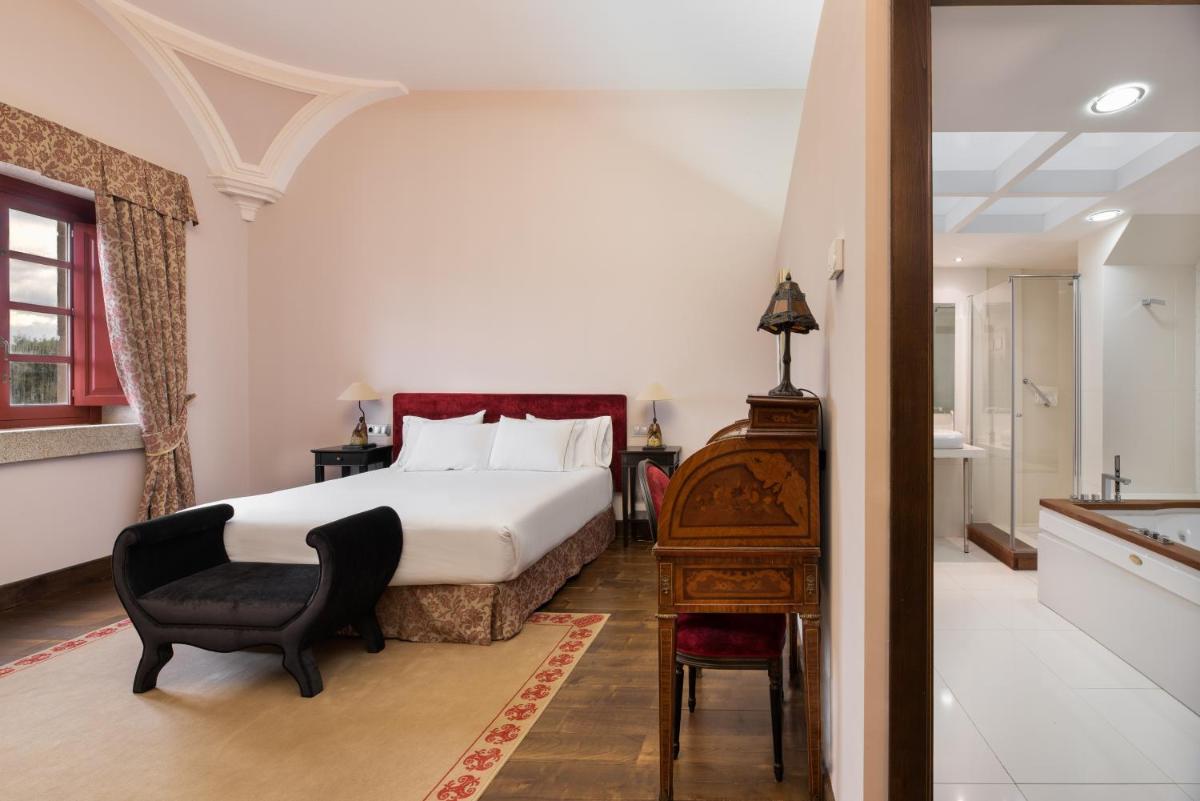 Cama o camas de una habitación en Áurea Palacio de Sober by Eurostars Hotel Company