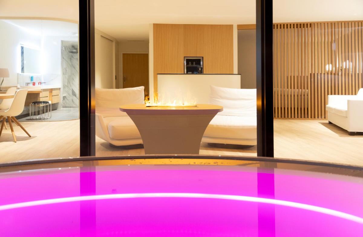 Coin salon dans l'établissement 6717 Nature Hôtel & Spa Le Clos des Délices