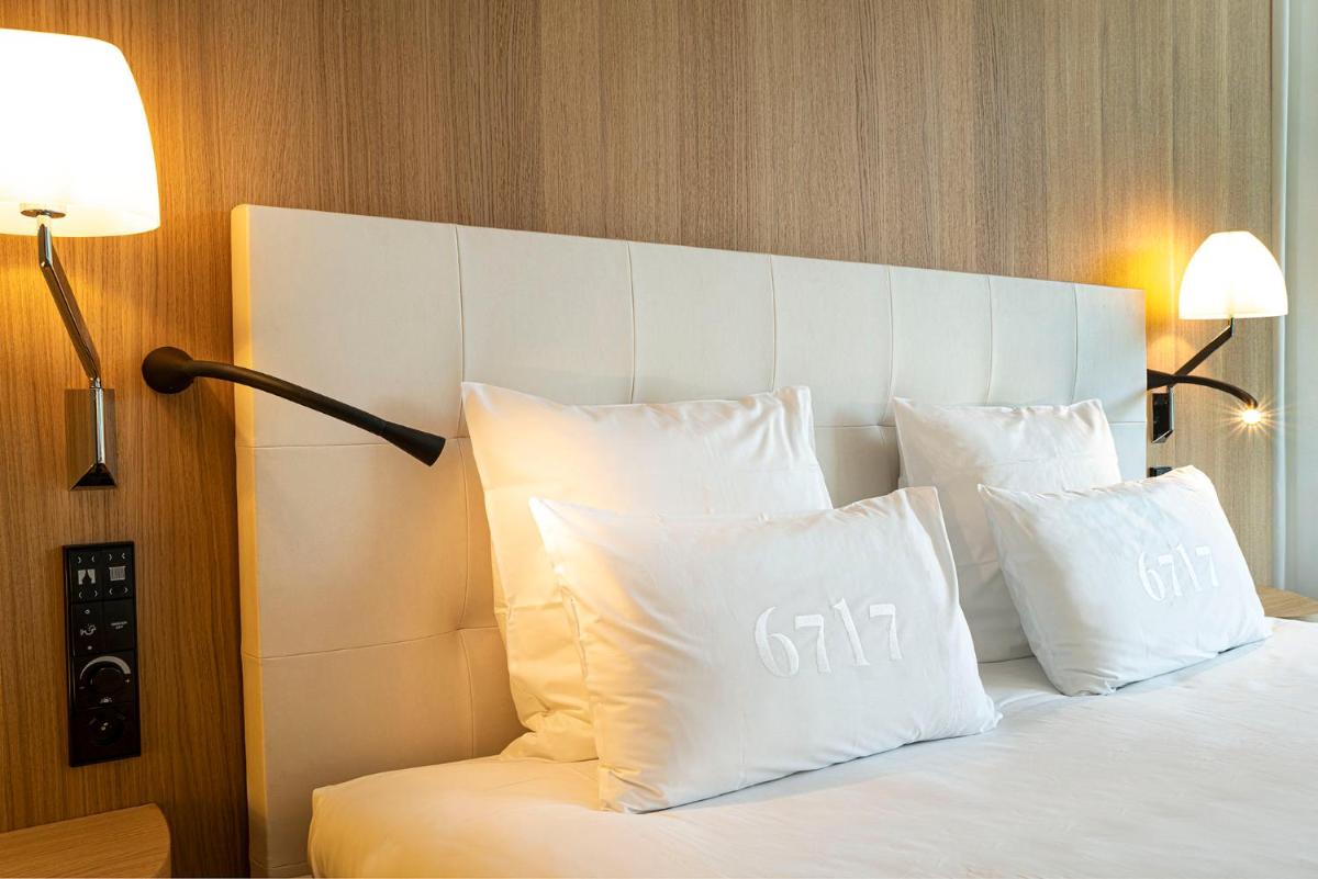 Un ou plusieurs lits dans un hébergement de l'établissement 6717 Nature Hôtel & Spa Le Clos des Délices