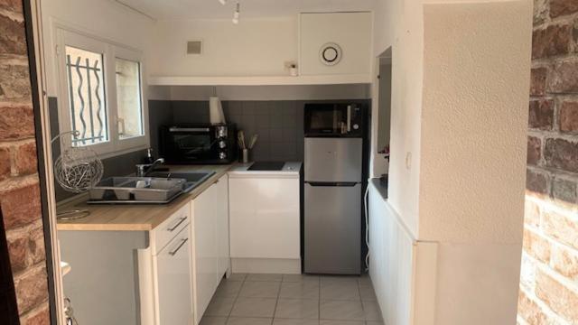 Appartement sur cour, en rez de chaussée, CLIM - Housity