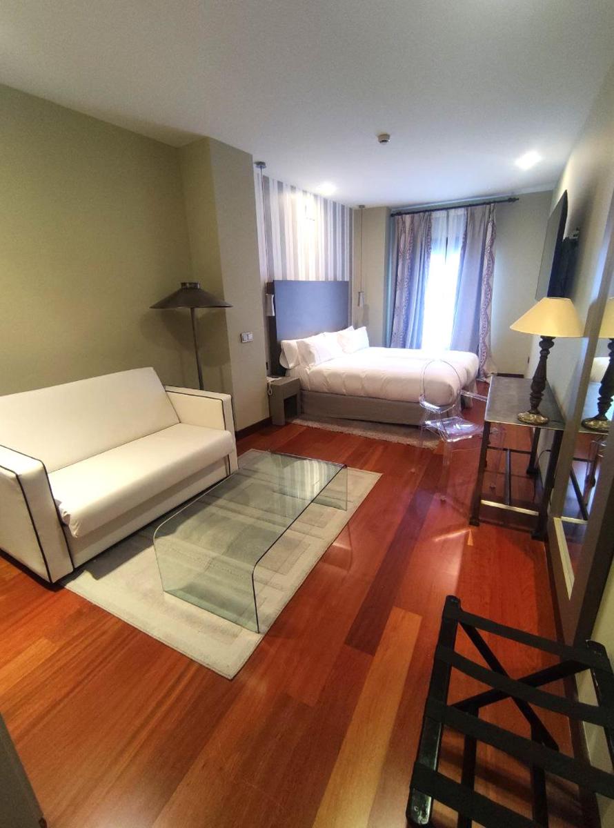 Cama o camas de una habitación en Hotel AR Isabel de Farnesio