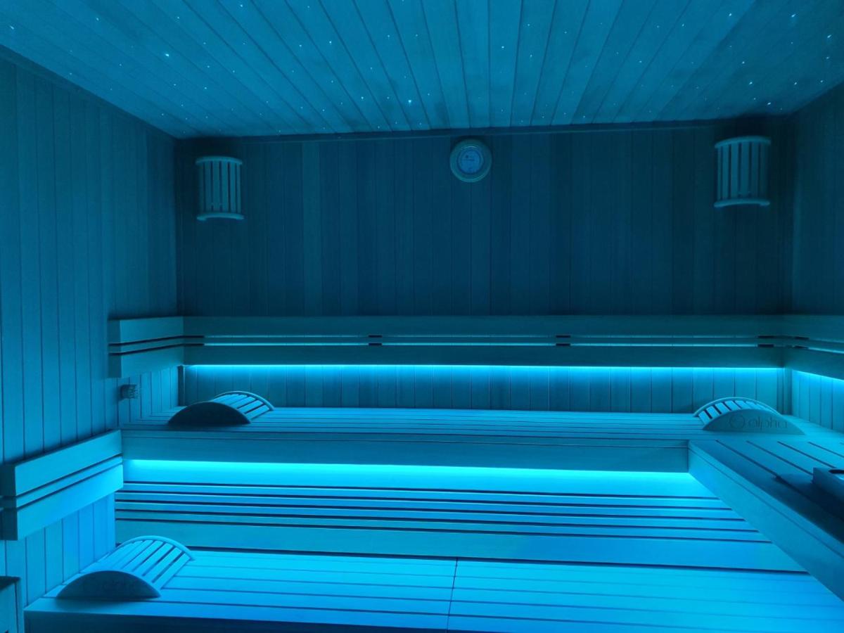 Coin salon dans l'établissement Hôtel Spa Marotte