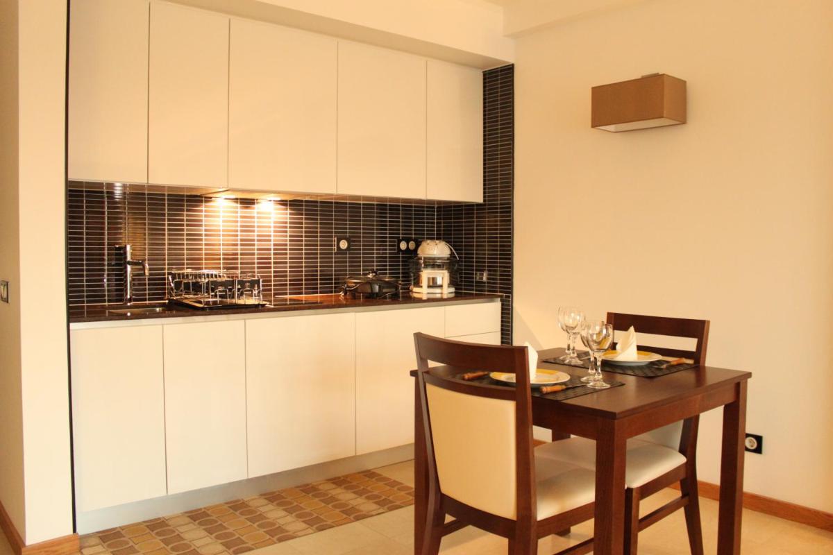 A cozinha ou kitchenette de Hotel O Gato & Spa