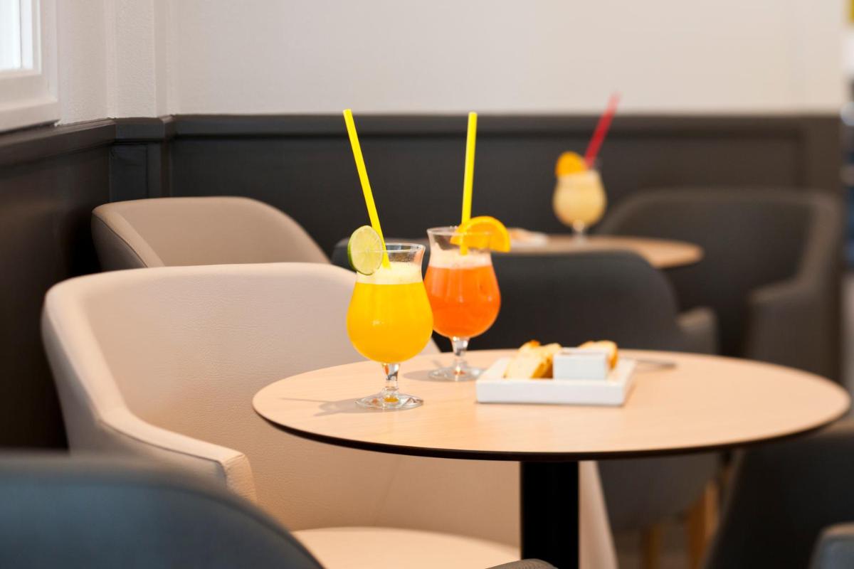 Boissons dans l'établissement Hotel Les Dunes