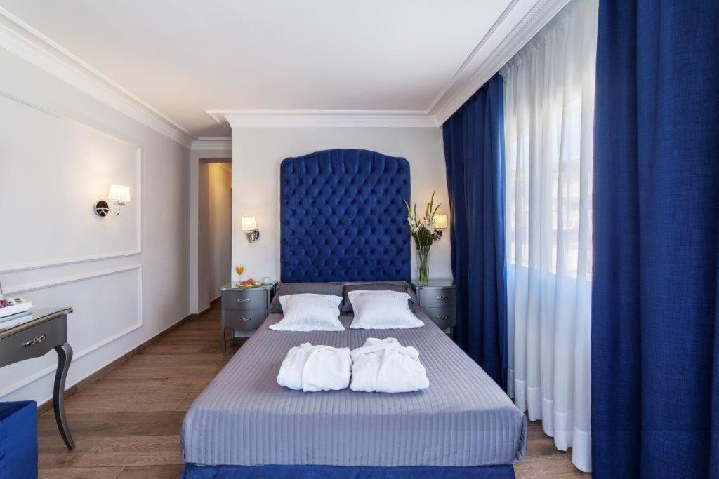 Cama o camas de una habitación en Essence Hotel Boutique