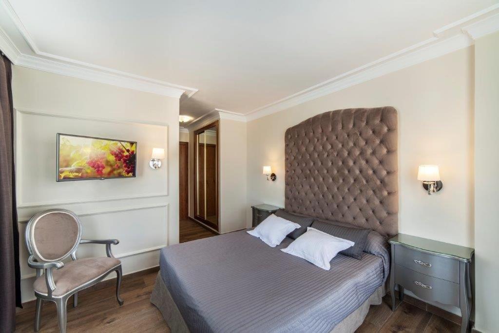 Cama o camas de una habitación en Essence Hotel Boutique