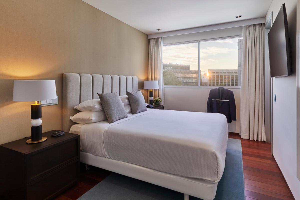 Cama o camas de una habitación en Hyatt Regency Madrid Residences