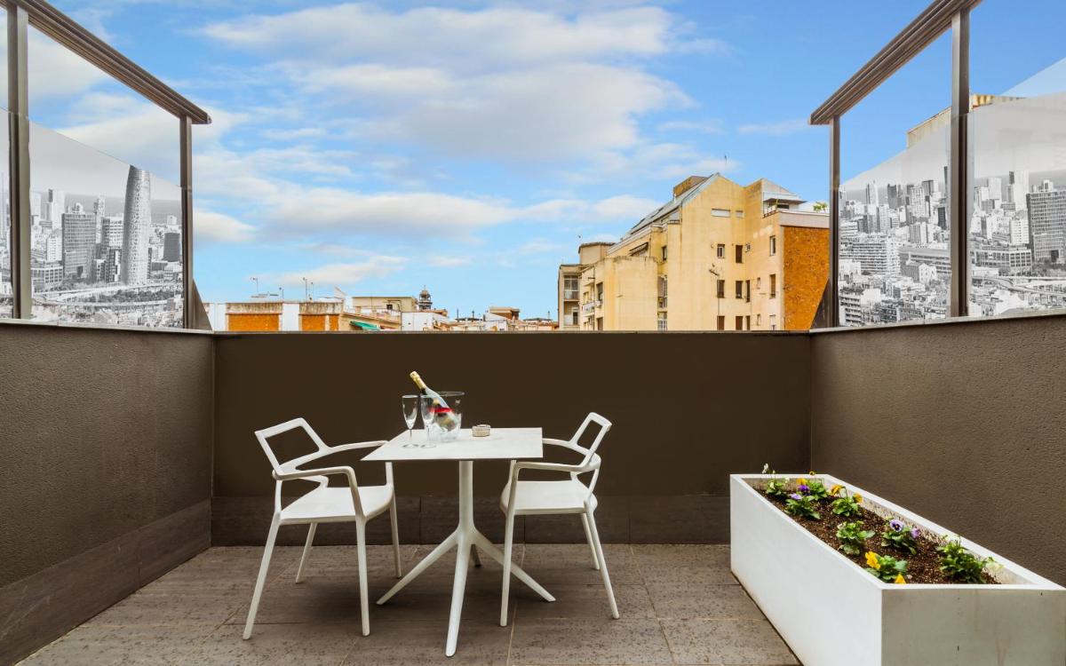 Un balcón o terraza de Grums Hotel & Spa