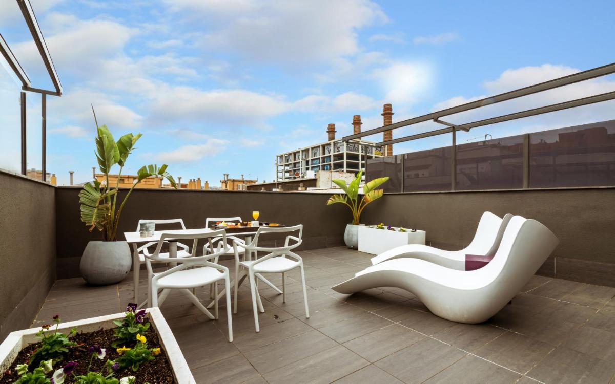 Un balcón o terraza de Grums Hotel & Spa