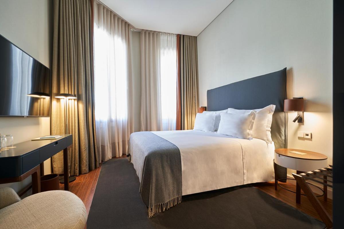 Uma cama ou camas num quarto em PortoBay Flores