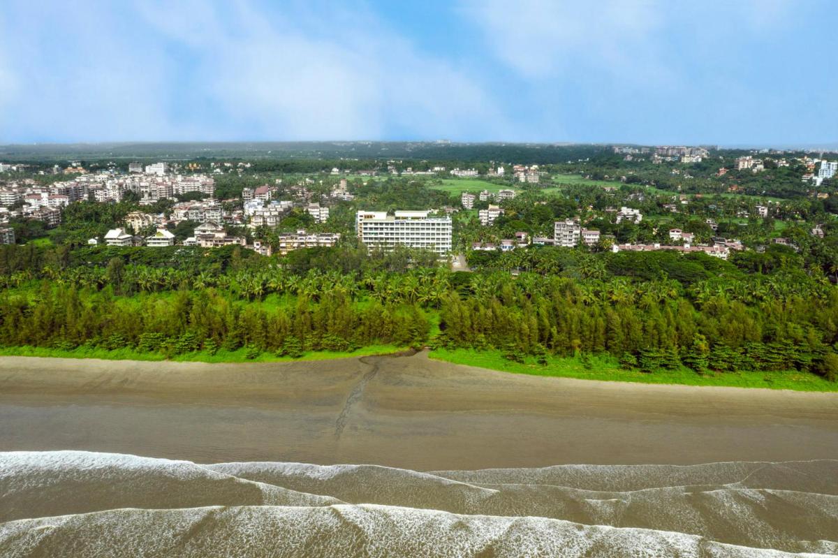 a view of a city from the top of a hill at Vivanta Goa, Miramar in Panaji a view of a city from the top of a hill at Vivanta Goa, Miramar in Panaji