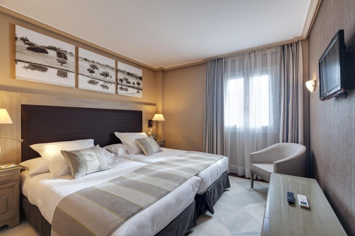 Cama o camas de una habitación en Barceló Montecastillo Golf