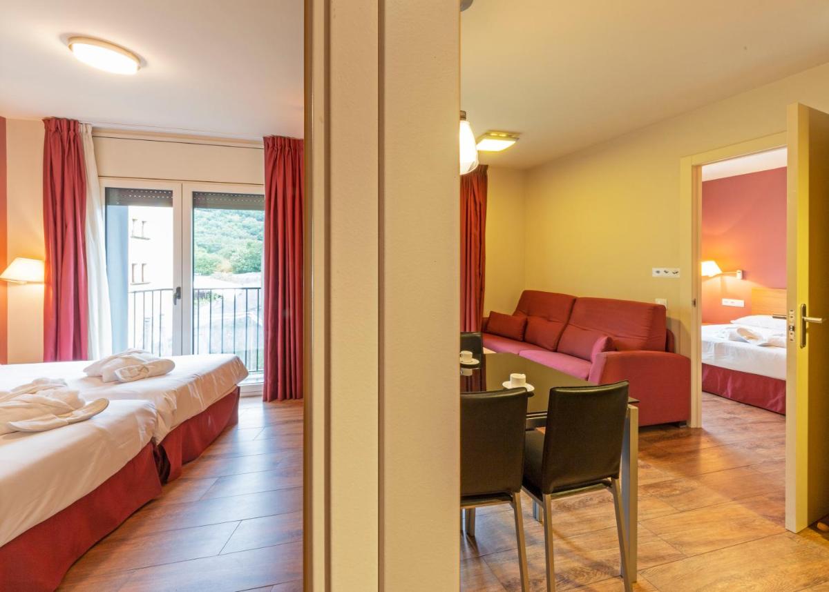 Cama o camas de una habitación en Aparthotel Trainera